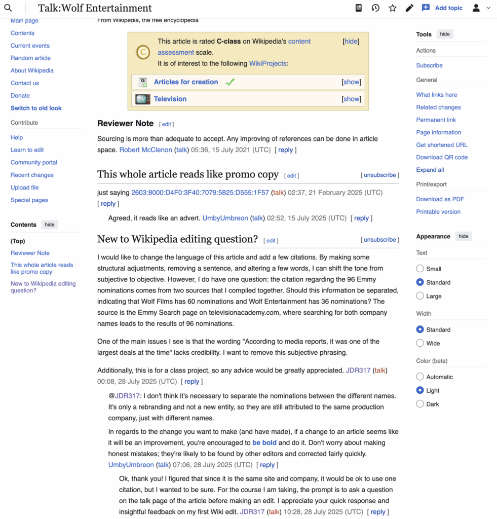 Screenshot of talk page conversation for Wolf Entertainment Article Curated By: John Rhorer, July 2025