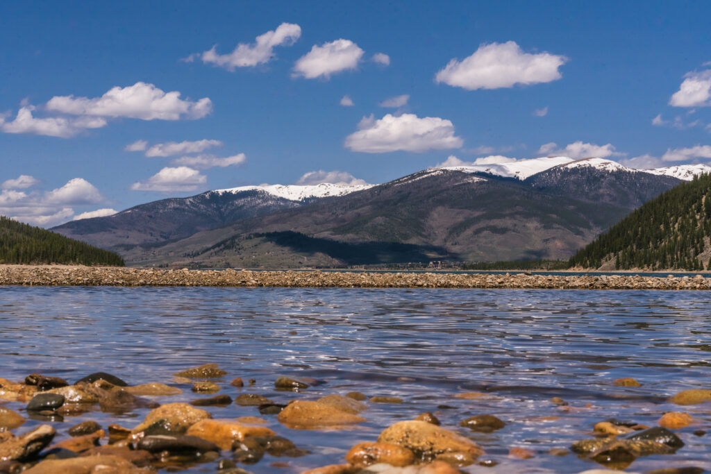 Colorado landscape with rocks and mountains in the distance.