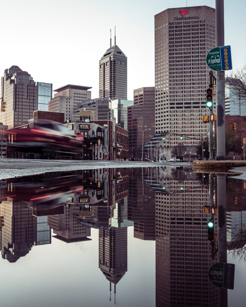 Indianapolis reflective photo off of a puddle in downtown Indianapolis. 