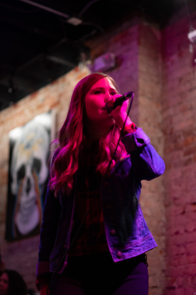 Molly performing at Square Cat.