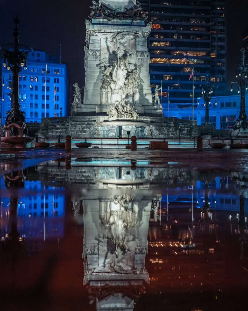 Monument circle Indianapolis Indiana reflection from a puddle. 